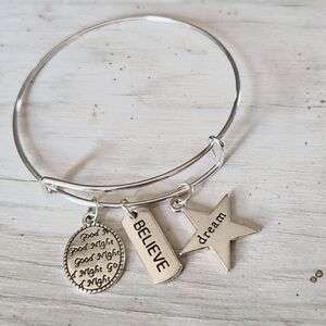 Bracelets by Sandra silver tone adjustable, Believe